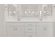 Bright bathroom has a double sink vanity, modern fixtures, and great lighting at 4735 W Stargazer Pl, Laveen, AZ 85339