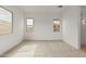 This bedroom features plush carpeting, bright windows, and ample natural light at 4735 W Stargazer Pl, Laveen, AZ 85339