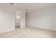Spacious bedroom with plush carpet that leads to an attached bathroom at 4735 W Stargazer Pl, Laveen, AZ 85339