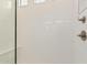 Modern walk-in shower with white subway tiles and brushed nickel fixtures at 4735 W Stargazer Pl, Laveen, AZ 85339