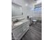 Bathroom with a vanity, toilet, and shower/tub combo at 6245 W Southgate St, Phoenix, AZ 85043