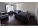 Bedroom with two beds and a sofa at 6245 W Southgate St, Phoenix, AZ 85043