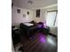 Cozy bedroom with a double bed and dark bedding at 6245 W Southgate St, Phoenix, AZ 85043