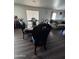 Elegant dining room with dark wood table and six chairs at 6245 W Southgate St, Phoenix, AZ 85043