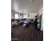 Spacious living room with a large sectional sofa and coffee table at 6245 W Southgate St, Phoenix, AZ 85043