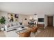 Bright living room featuring modern furnishings, wood floors, and an open floor plan at 7930 E Camelback Rd # 506, Scottsdale, AZ 85251