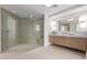 Stylish bathroom featuring an oversized shower and double sinks at 6901 E Restin Rd, Carefree, AZ 85377