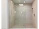 This bathroom features a tiled shower with a glass enclosure and neutral color palette at 6901 E Restin Rd, Carefree, AZ 85377