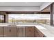Kitchen featuring a large picture window with sink and stainless steel appliances at 6901 E Restin Rd, Carefree, AZ 85377