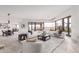 Spacious living area with large windows providing panoramic desert views and an open floor plan at 6901 E Restin Rd, Carefree, AZ 85377