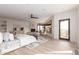 Bright bedroom with tile floors, a fireplace, and great views of the surrounding landscape at 6901 E Restin Rd, Carefree, AZ 85377