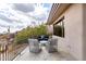 Comfortable outdoor seating area with desert views and stone flooring, perfect for relaxing and enjoying the Arizona landscape at 6901 E Restin Rd, Carefree, AZ 85377