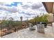 Stunning outdoor patio with ample seating space and desert views; ideal for entertaining or unwinding in the Arizona sun at 6901 E Restin Rd, Carefree, AZ 85377