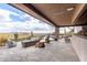 Spacious patio featuring comfortable seating, desert views, a rock garden, and inviting pool for ultimate relaxation and enjoyment at 6901 E Restin Rd, Carefree, AZ 85377