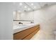 Modern main bathroom boasts a dual sink vanity, sleek fixtures, and a luxurious marble finish for a spa-like experience at 7127 E Rancho Vista Dr # 4001, Scottsdale, AZ 85251