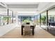 Contemporary dining room bathed in natural light, complete with stylish seating for eight and an inviting atmosphere at 7127 E Rancho Vista Dr # 4001, Scottsdale, AZ 85251