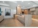 Modern kitchen with island, wood cabinets, and stainless steel appliances at 7127 E Rancho Vista Dr # 4001, Scottsdale, AZ 85251