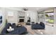 Spacious Gathering room featuring a fireplace and access to the pool at 6782 W Skylark Dr, Glendale, AZ 85308