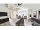 Large main bedroom with a barn door, sitting area, and ample natural light at 6782 W Skylark Dr, Glendale, AZ 85308