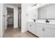 Modern bathroom with double vanity and walk-in shower at 40503 W Wade Dr, Maricopa, AZ 85138