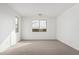 Bright bedroom with neutral walls and carpet at 40503 W Wade Dr, Maricopa, AZ 85138