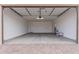 Attached garage with ample space for parking and storage at 40503 W Wade Dr, Maricopa, AZ 85138