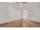 Simple bedroom with wood floors and ceiling fan at 3633 N 3Rd Ave # 1089, Phoenix, AZ 85013