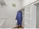 Well-organized closet with shelves and hanging rod at 3633 N 3Rd Ave # 1089, Phoenix, AZ 85013