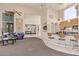 Community room with seating, kitchen, and billiard table at 3633 N 3Rd Ave # 1089, Phoenix, AZ 85013