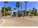 Community entrance with palm trees and brick driveway at 3633 N 3Rd Ave # 1089, Phoenix, AZ 85013