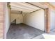 Empty garage with overhead door and interior access at 3633 N 3Rd Ave # 1089, Phoenix, AZ 85013