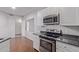 Kitchen with stainless steel appliances and granite countertops at 3633 N 3Rd Ave # 1089, Phoenix, AZ 85013