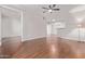 Open living room with wood floors and access to other rooms at 3633 N 3Rd Ave # 1089, Phoenix, AZ 85013