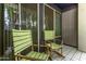 Private patio with two striped chairs at 3633 N 3Rd Ave # 1089, Phoenix, AZ 85013
