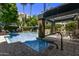 Community pool with lounge chairs and covered seating at 3633 N 3Rd Ave # 1089, Phoenix, AZ 85013