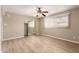 Large bedroom with ample natural light, ceiling fan, and closet at 5625 N 47Th Ave, Glendale, AZ 85301