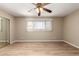 Large bedroom with ample natural light, ceiling fan, and closet at 5625 N 47Th Ave, Glendale, AZ 85301