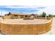 Single-story home featuring desert landscaping and a decorative brick retaining wall at 5625 N 47Th Ave, Glendale, AZ 85301