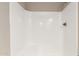 Clean, white shower stall features modern fixtures and a sleek design at 5625 N 47Th Ave, Glendale, AZ 85301