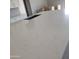 Close-up view of a kitchen island with a white quartz countertop at 1973 W Brooke Ln, Queen Creek, AZ 85144