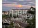 Luxury apartments at sunset with palm trees at 2511 W Queen Creek Rd # 374, Chandler, AZ 85248