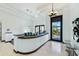 Bright entryway features unique chandelier, modern design elements, and views to the outside at 25583 N 89Th St, Scottsdale, AZ 85255