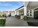 Spacious outdoor kitchen with bar seating, stone accents, and ample counter space for entertaining at 25583 N 89Th St, Scottsdale, AZ 85255