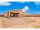 New construction home with a large backyard and covered patio at 19536 W Cambridge Ave, Buckeye, AZ 85396