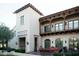 Spanish-style community center with patio seating at 19781 W Exeter Blvd, Litchfield Park, AZ 85340