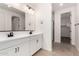 Modern bathroom with double vanity and walk-in shower at 40532 W Wade Dr, Maricopa, AZ 85138