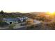 An aerial view of the neighborhood with a desert landscape, mountain views, and desert trees at 6737 E Rockaway Hills Dr, Cave Creek, AZ 85331