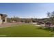 Artificial turf and desert landscape create a relaxing space at 6737 E Rockaway Hills Dr, Cave Creek, AZ 85331