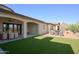 Artificial turf and patio furniture highlight this backyard at 6737 E Rockaway Hills Dr, Cave Creek, AZ 85331