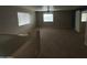 Spacious bonus room with carpet and bright natural light at 23671 W Wayland Dr, Buckeye, AZ 85326